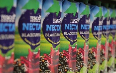 Tesco reduces the sugar content of its own branded soft drinks