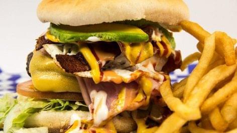 A twelve thousand calorie hamburger is served at a British pub