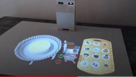 AR lamp projects the dishes of the menu – Video of the day
